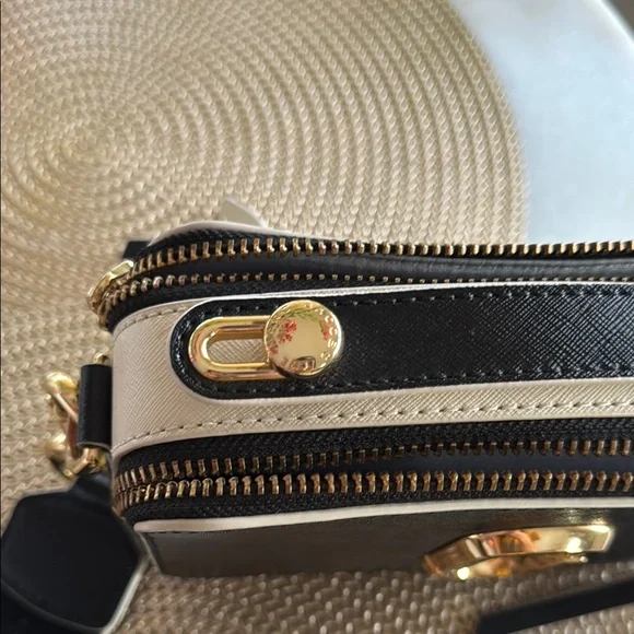 Marc Jacobs Black and Gold Crossbody Bag with Chic Elegance
